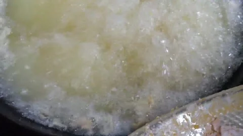 Chef Lowering Battered Chicken Pieces Into Deep Fryer With Boiling Oil 스톡 동영상 343027584