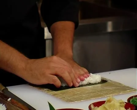 Chef make sushi roll Stock Footage 10610492