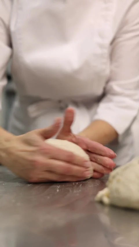 A chef makes bread in a bakery Stock Footage 264965271