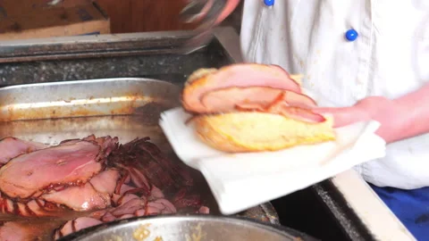 Chef makes fast food with meat, spice, bread and onion Stock Footage 87656397