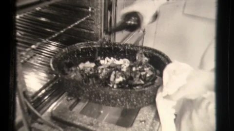 Chef Makes Fish in Oven, Gourmet Dinner being prepared. Cooks in the kitchen, co Stock Footage 130003473