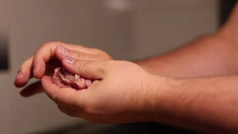 Chef makes, forms round meatball, burger patties, cutlet of ground beef Video stock 343683838