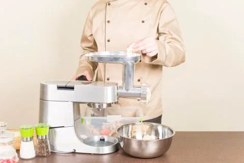 Chef makes mincemeat Stock Photos