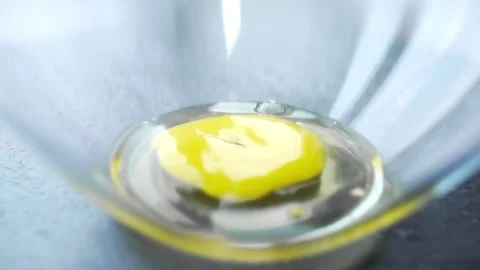 Chef makes omelet raw eggs and cream teasty breakfast Stock Footage 143778580