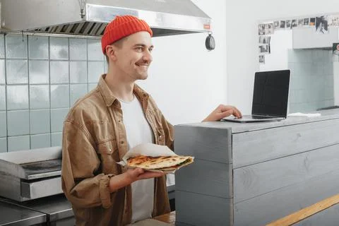 Chef makes an order on the internet Stock Photos
