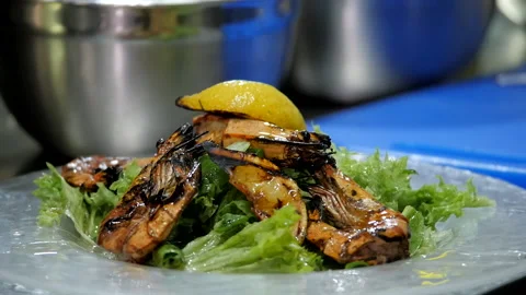 Chef Makes a Prawns Dish Stock Footage 131366537