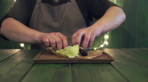 Chef makes salad with warm salmon Stock Footage 62660613