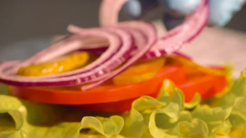 The chef makes a sandwich with meat Stock Footage 158021649