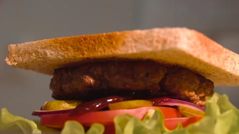 The chef makes a sandwich with meat Stock Footage 158021672