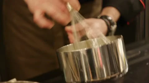 The chef makes the sauce Stock Footage 12752589