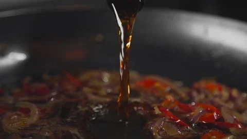 Chef makes sauce for meat dark beer roast Stock Footage 143778794