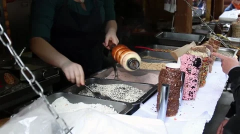 Chef makes sweets on the street fair Stock Footage 63166529