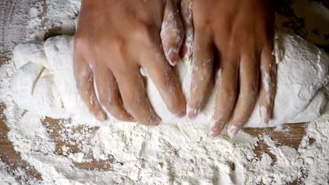 Chef Making bread Baker kneading dough flour on wooden table enjoying hobby.. Stock Footage 272566246