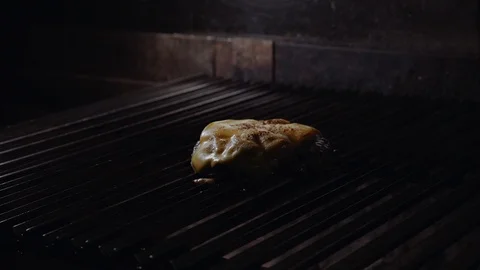 Chef making burger. Cooking hamburger. Beef or pork cutlet grilling on grid. 4K Stock Footage 97575710