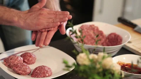 Chef making burgers in kitchen with ground beef Stock Footage 50446687