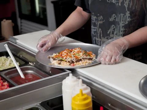 Chef making burrito Foto stock