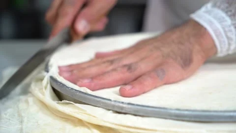 The chef is making the carrot slice baklava recipe. Stock Footage 150083888