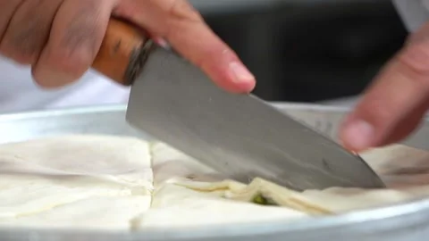 The chef is making the carrot slice baklava recipe. Stock Footage 150083995