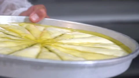 The chef is making the carrot slice baklava recipe. Stock Footage 150084096
