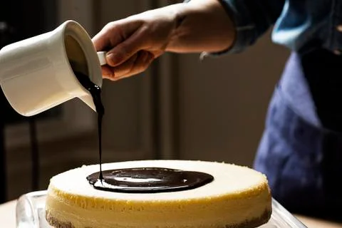Chef is making chocolate cake Stock Photos