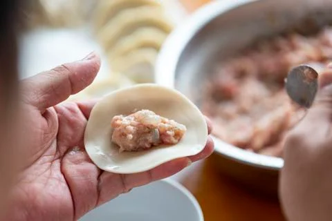 A chef is making dumplings Fotos de archivo
