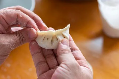 A chef is making dumplings Foto stock