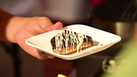 Chef making fresh and crispy delicious waffles at a dessert counter Vídeo Stock 346388908