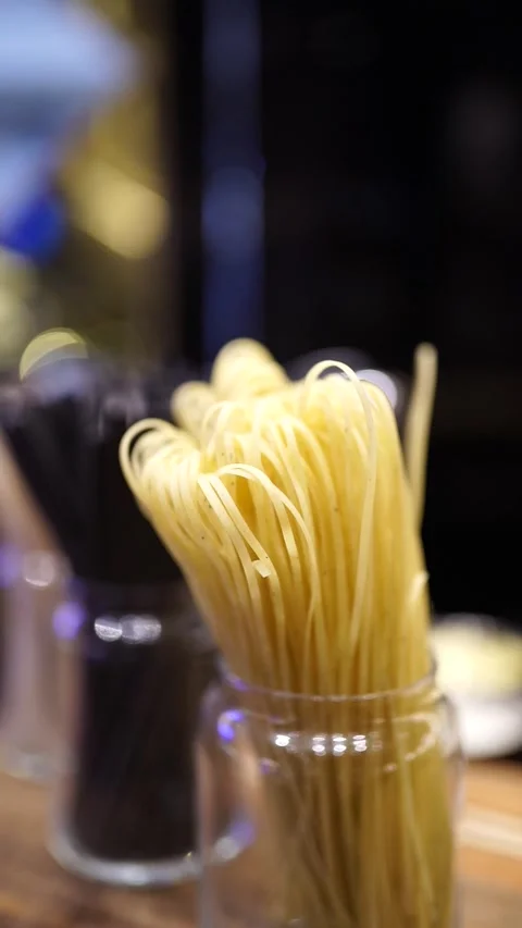 Chef Making Fresh Pasta with Machine Close-Up Vertical Stock Footage 294805730