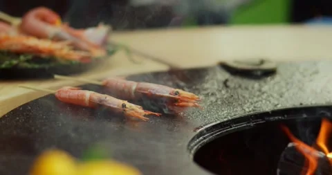 Chef making grilled food hotel cuisine meat seafood grill restaurant Stock Footage 336576434