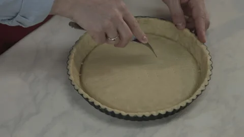 Chef Making Holes in Dough with Fork Kitchenware Stock Footage 164020146