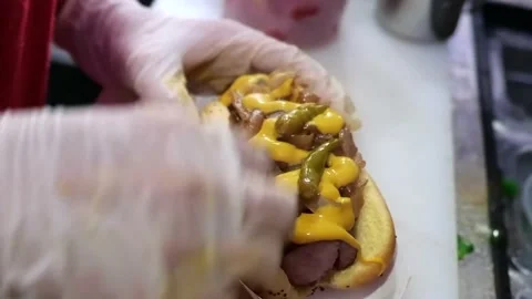 The chef is making a hot dog Stock Footage 171360606