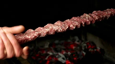 Chef making a kebab on the skewer Stock Footage 59185917