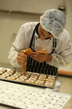 Chef making Mini Tartlets Stock Photos