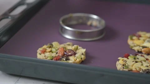 Chef making Mixed Nut and Dried fruits and Seeds Florentine cookies. Stock Footage 131991477