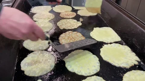 A chef is making Pancake 스톡 동영상 168983231