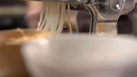 Chef making pasta from hand pasta machine, home cooking style Stock Footage 120553808