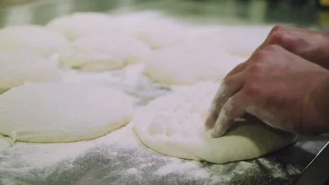 Chef is making pizza dough Stock Footage 147704270
