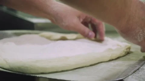 Chef is making pizza dough Stock Footage 147704297