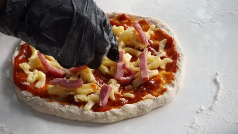 Chef is making pizza with ham and cheese. Stock Footage 196901159