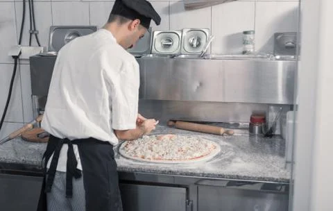 Chef making pizza Stock Photos