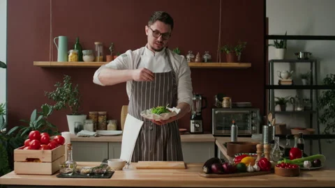 Chef Making Salad while Cooking Show Recording Stock Footage 266981238