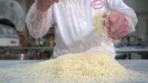 A chef making shredded wheat dessert Stock Footage 150081406