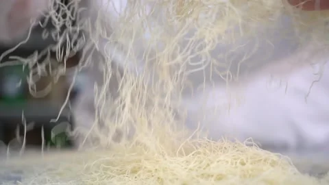 A chef making shredded wheat dessert Stock Footage 150081448