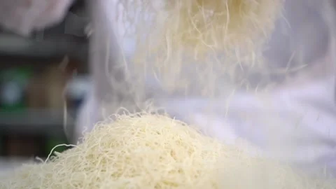 A chef making shredded wheat dessert Stock Footage 150081451