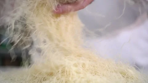 A chef making shredded wheat dessert Stock Footage 150081469