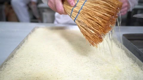 A chef making shredded wheat dessert Stock Footage 150081595