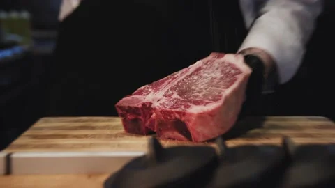The chef is making steaks for frying. Stock Footage 130988620