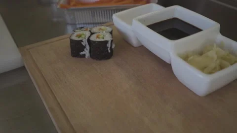 A chef is making sushi. The process of preparing an Asian sushi dish Stock Footage 144393878