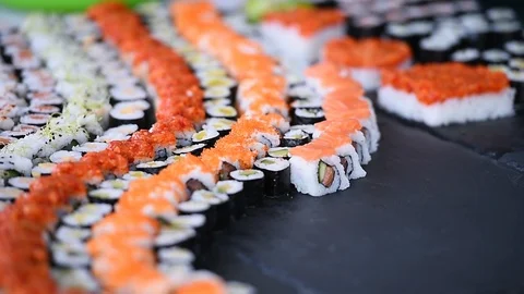 Chef making sushi rolls during a sushi culinary workshop Video stock 102496990