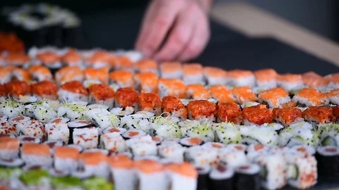 Chef making sushi rolls during a sushi culinary workshop Video stock 102497081
